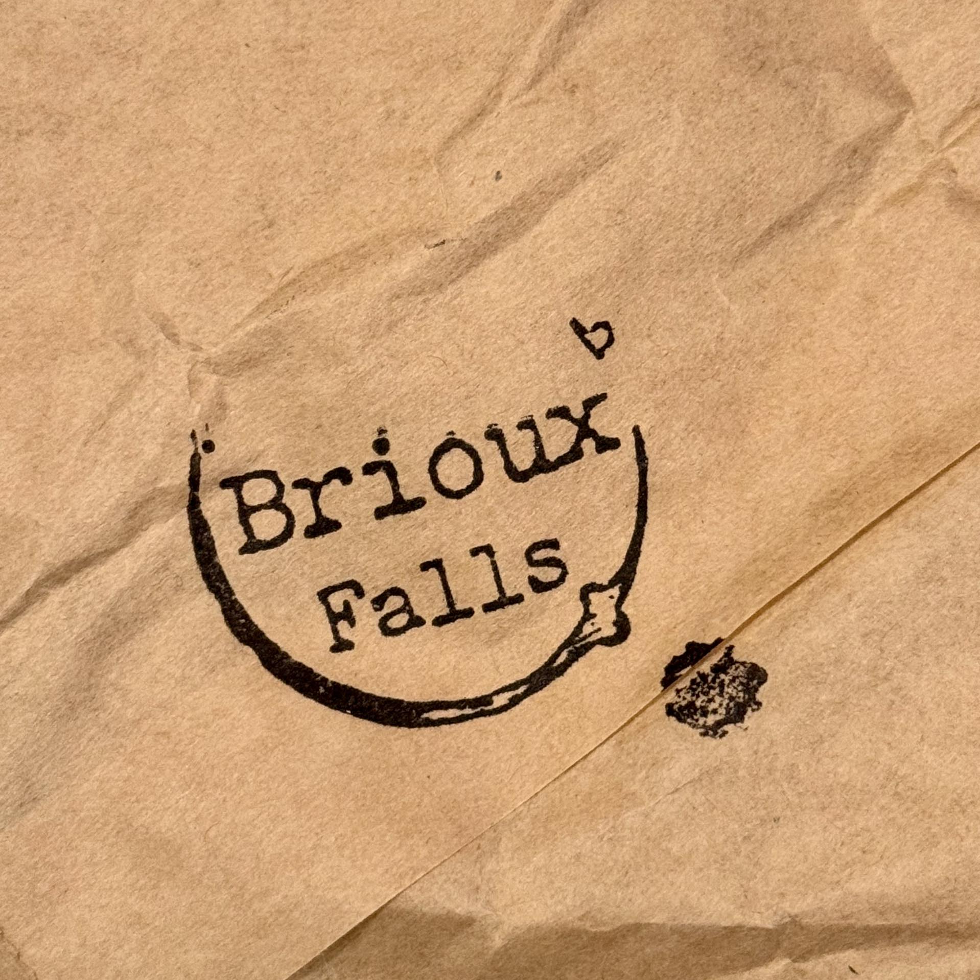 Brioux Falls logo stamped on wood